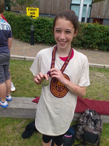 Kati Hulme with her Wenlock Games high jump gold medal
